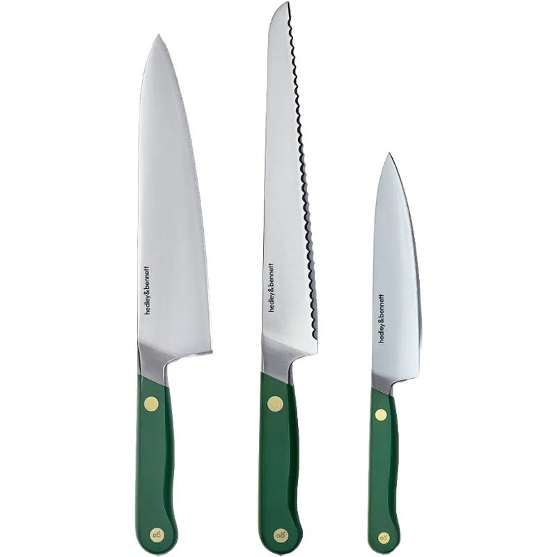 Three Hedley & Bennett stainless steel kitchen knives with green handles and brass rivets, shown vertically against a plain white background.