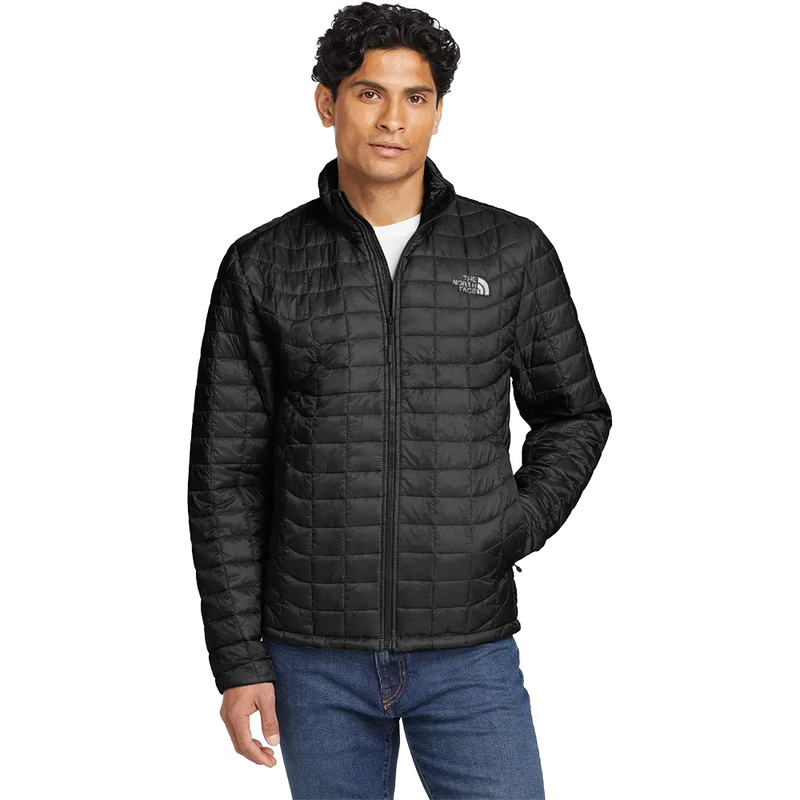 Model wearing The North Face ThermoBall Trekker insulated jacket in TNF Matte Black