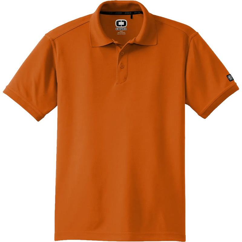 An orange short-sleeve polo shirt with a collar and two-button placket, shown on a plain white background. A logo patch is visible on the left chest, and a small logo tag is on the right sleeve.