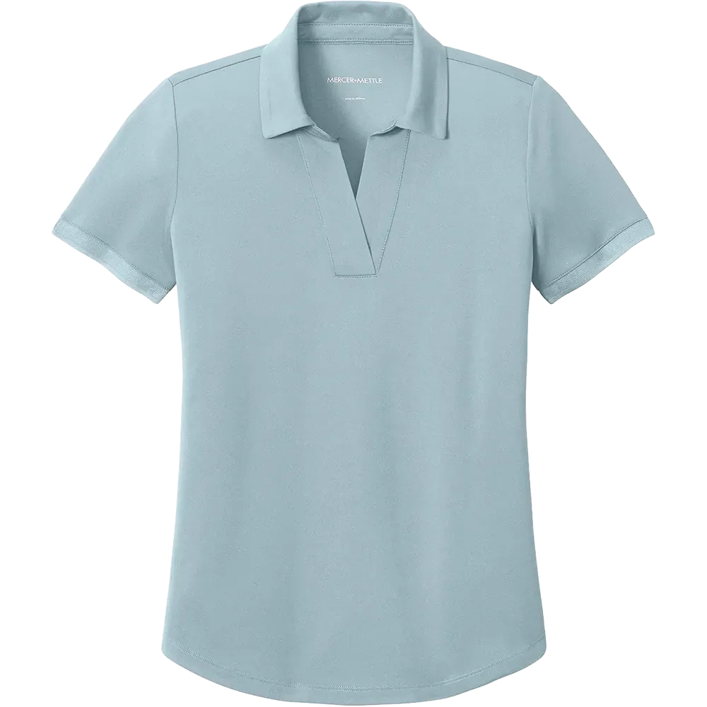 Mercer Mettle Women's Everyday Performance Polo in Celestial Blue featuring moisture-wicking performance fabric, short sleeves, an open Y-neck collar, and a feminine tailored fit