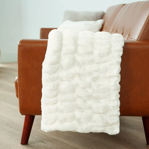 Minky_Couture_Hugs_Adult_Blanket_-_Cream_-_Lifestyle.png