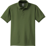 An olive green short-sleeve polo shirt by Oakley, shown flat against a solid white background. The shirt features the Oakley logo on the inner neck label and a small logo patch on the left sleeve.