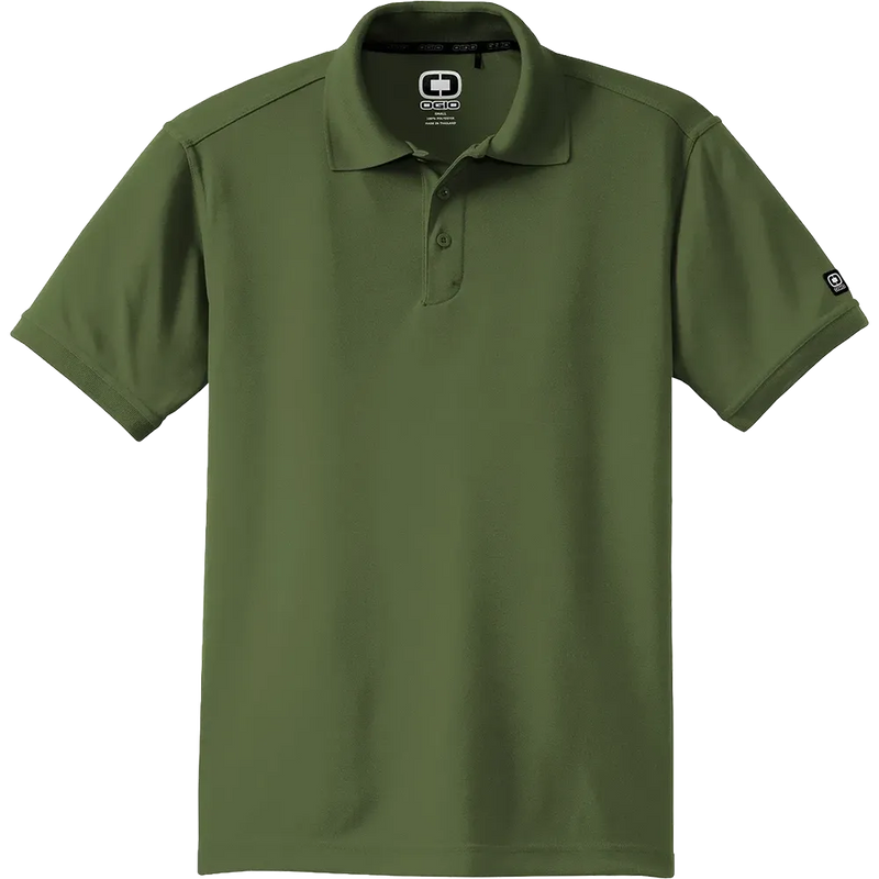 An olive green short-sleeve polo shirt by Oakley, shown flat against a solid white background. The shirt features the Oakley logo on the inner neck label and a small logo patch on the left sleeve.