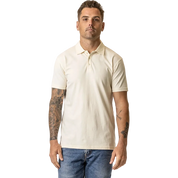 Man wearing a natural organic cotton polo shirt