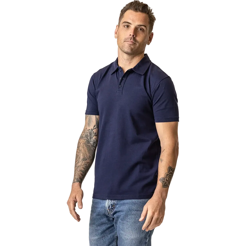 Man wearing a navy organic cotton polo shirt