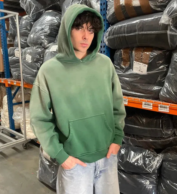 blanksbythirteen-faded-kelly-hoodie-model.webp