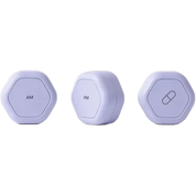 Three small round pill tracker devices in a pale lavender color, shown from different angles on a plain white background. The left device is labeled 'AM', the center device is labeled 'PM', and the right device has a capsule icon.