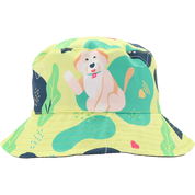 A children's bucket hat with a bright yellow-green base and a colorful cartoon dog print on the front, shown against a plain white background.