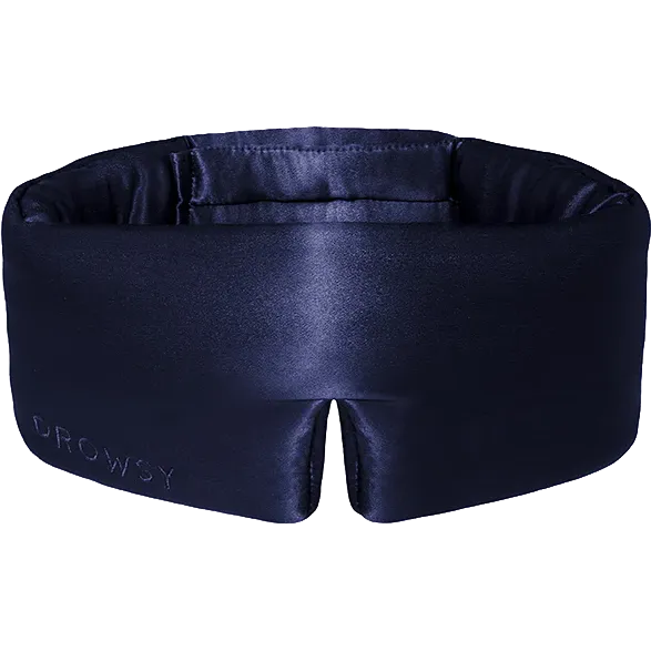A dark navy blue satin sleep mask with the brand name 'DROWSY' debossed on the lower left side, shown against a plain white background.