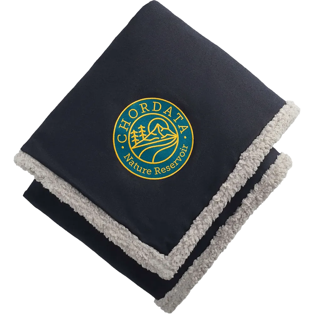 Field & Co. Oversized Wool Sherpa Blanket in Navy with soft sherpa lining and embroidered Chordata Nature Reservoir logo