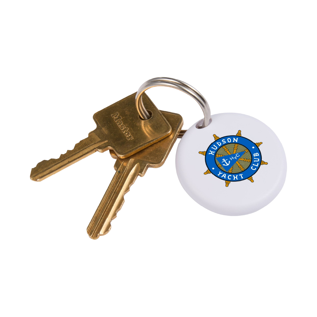 Two keys attached to a keychain with a Hudson Yacht Club logo on a white background