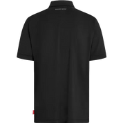 Black short-sleeve polo shirt shown from the back, featuring a white Ghostgolf logo printed inside the collar and a small red tag near the bottom left hem, set against a plain white background.