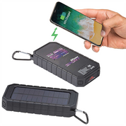 Solar power bank being used to charge a smartphone on a white background