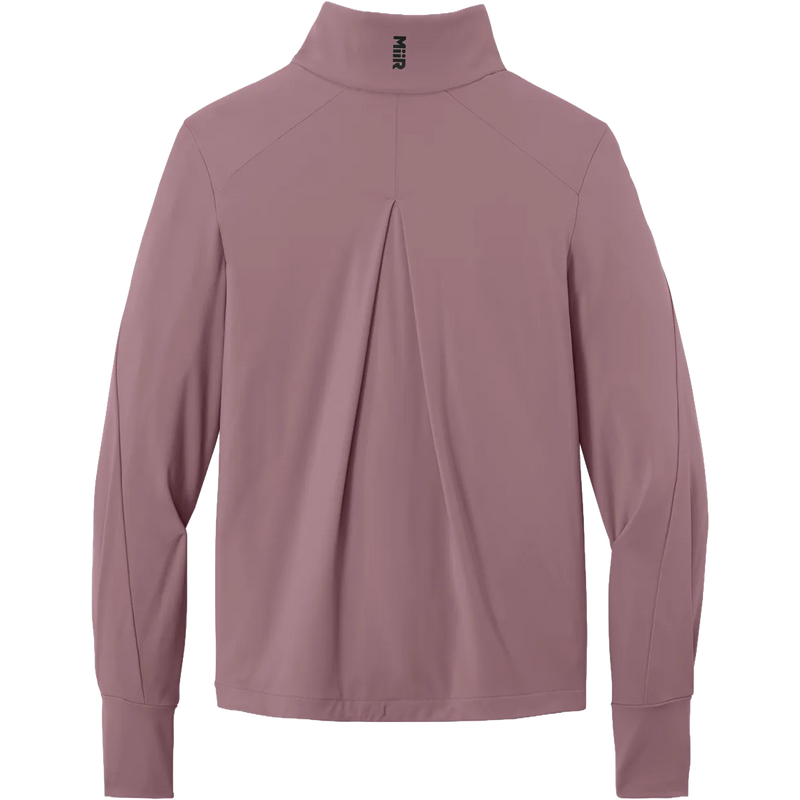 A long-sleeve athletic quarter-zip pullover in a dusty mauve or muted rose color, shown from the back. The garment features a mock neck collar with a small black 'MNR' logo printed inside, a central back seam with a gathered pleat detail, and ribbed cuffs.