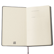 Open notebook with a visible brand logo on a white background