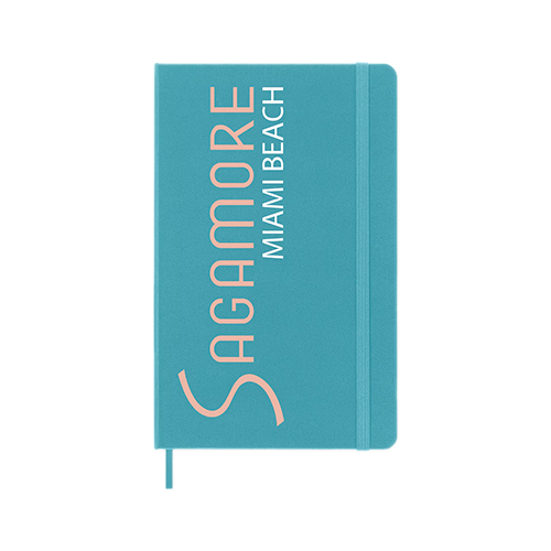 Teal notebook with 'Sagamore Miami Beach' text on a white background