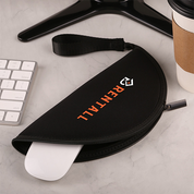 Black mouse pad with 'RENTAL' text on a desk with keyboard and coffee cup