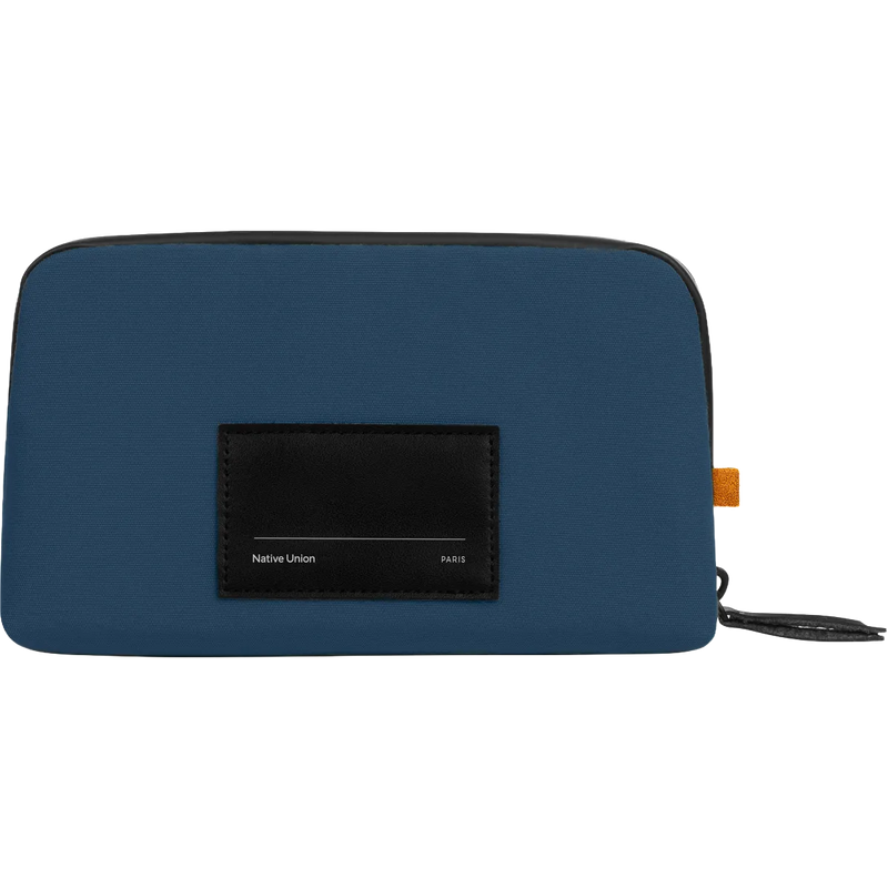 A blue zippered pouch with a black front label reading 'Native Union PARIS' and a small orange tab on the side, shown on a plain white background.