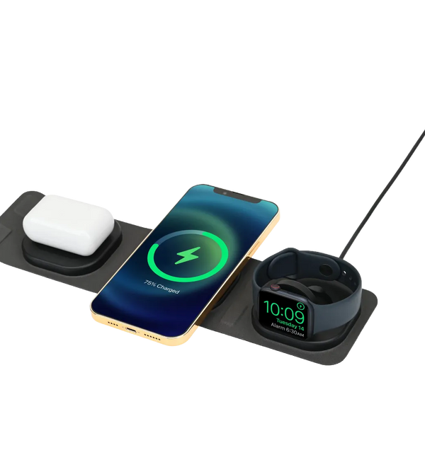 Wireless charging pad with smartphone, smartwatch, and airpods on a white background