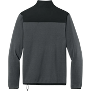 A dark gray and black colorblock quarter-zip fleece pullover shown from the back, featuring a solid black yoke and collar, and a dark gray body and sleeves.