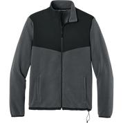 A colorblock fleece jacket with a black upper chest, shoulders, and collar, and a dark gray lower body and sleeves, shown on a plain white background.