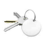 White keychain device attached to a set of keys on a white background