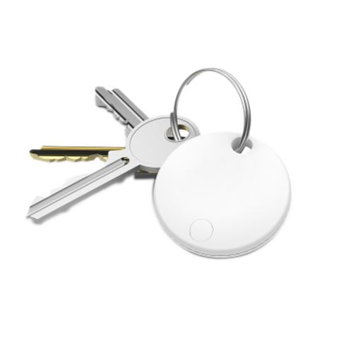 White keychain device attached to a set of keys on a white background