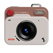 A retro-style digital camera with a beige front, a dusty rose-brown top section, a red circular button, and a black lens, shown on a plain white background.