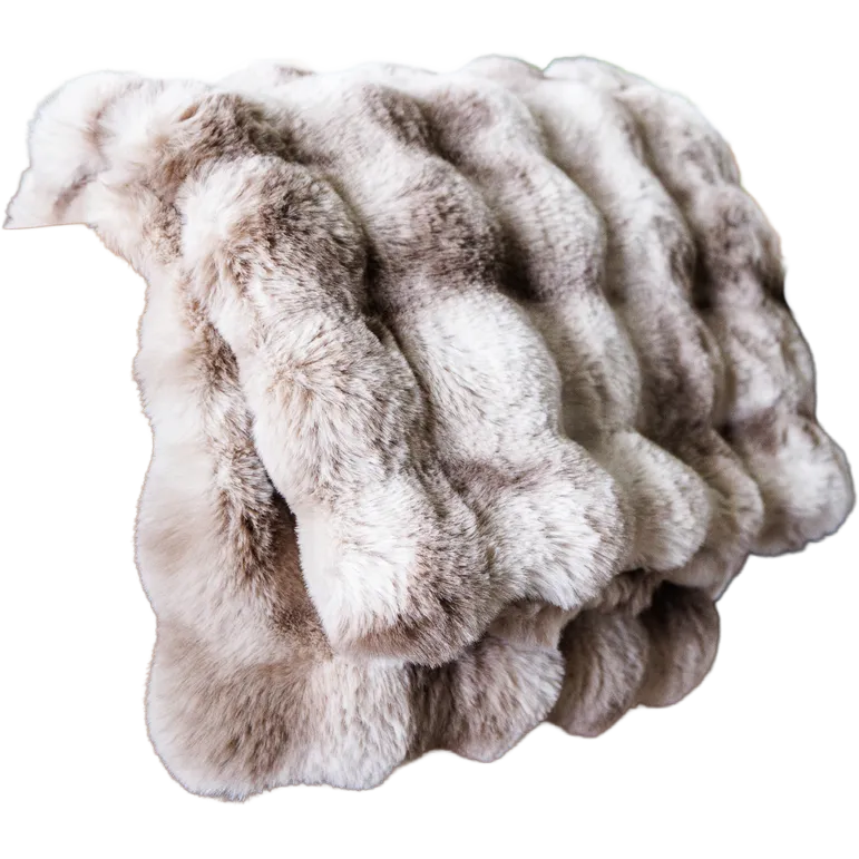 A plush faux fur throw blanket with a wavy, ribbed texture in shades of beige, cream, and light brown, isolated on a white background.