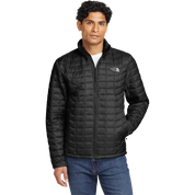 Model wearing The North Face ThermoBall Trekker insulated jacket in TNF Matte Black