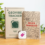 Geovibe Tracker packaging with a map design and branding on a wooden surface.